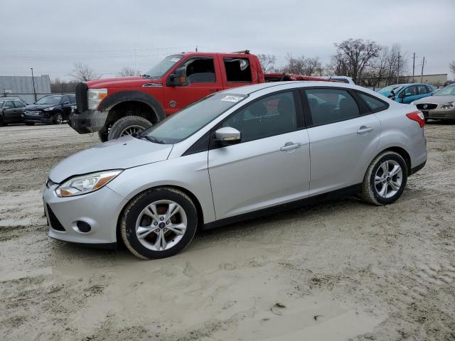 FORD FOCUS SE 2014 with VIN 1FADP3F25EL380391 - Photo from auction