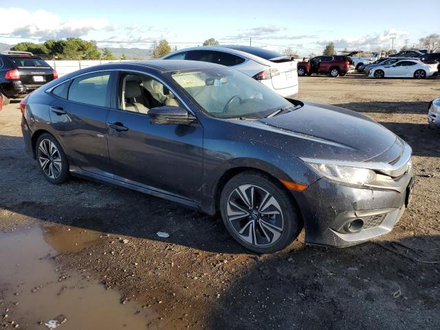 Photo 4 from auction – 2018 HONDA CIVIC EX with VIN JHMFC1F82JX043864