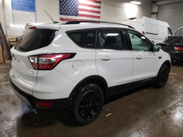 Photo 3 from auction – 2017 FORD ESCAPE SE with VIN 1FMCU9GD0HUC77620