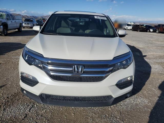 Photo 5 from auction – 2018 HONDA PILOT EXL with VIN 5FNYF6H56JB005419