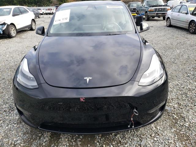 Photo 11 from auction – 2022 TESLA MODEL Y with VIN 7SAYGDEF7NF406274