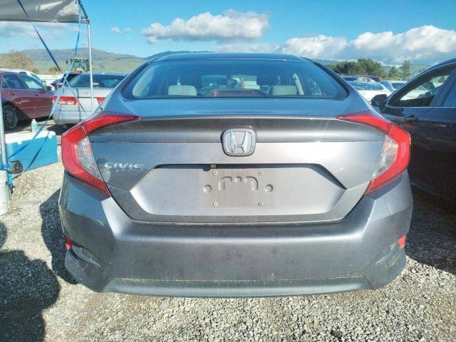 Photo 6 from auction – 2016 HONDA CIVIC LX with VIN 2HGFC2F51GH563016
