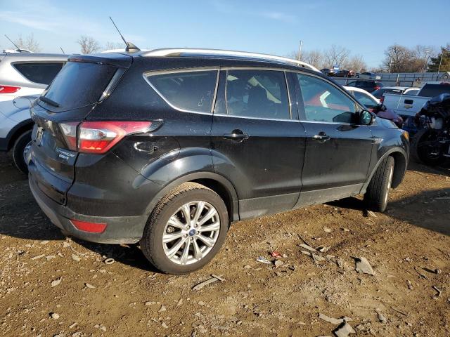 Photo 3 from auction – 2018 FORD ESCAPE TIT with VIN 1FMCU9J94JUC34683