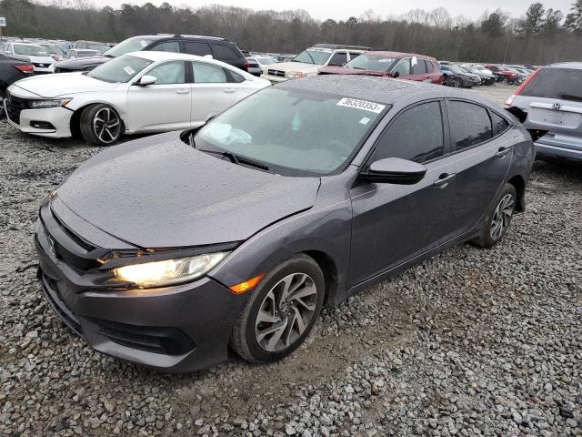 HONDA CIVIC EX 2018 with VIN 19XFC2F70JE027449 - Photo from auction