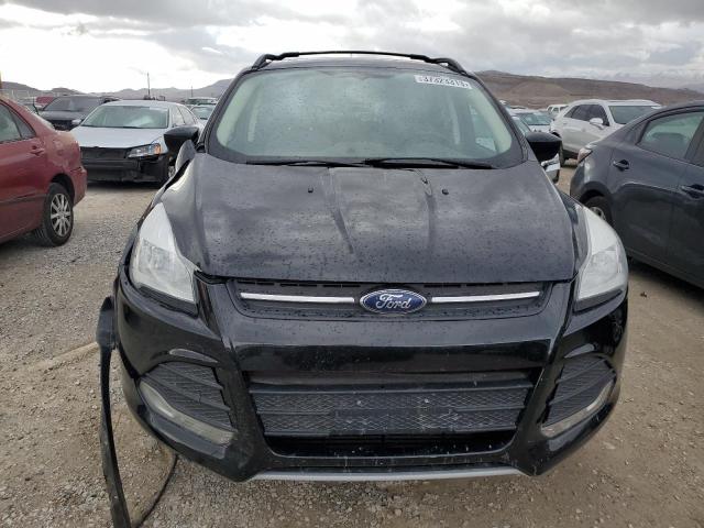 Photo 5 from auction – 2013 FORD ESCAPE SE with VIN 1FMCU9G96DUD44274