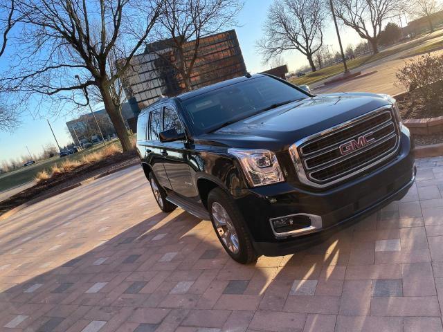 GMC YUKON SLT 2015 with VIN 1GKS1BKC4FR112673 - Photo from auction