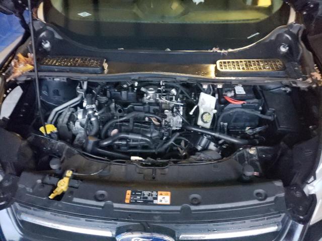 Photo 12 from auction – 2016 FORD ESCAPE SE with VIN 1FMCU9GX5GUB05673