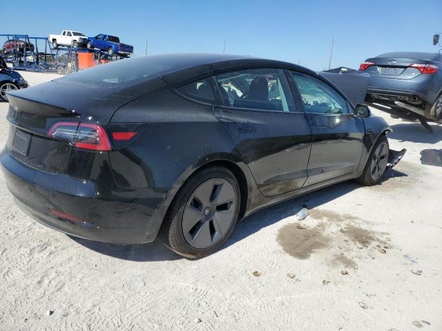 Photo 3 from auction – 2021 TESLA MODEL 3 with VIN 5YJ3E1EAXMF981029