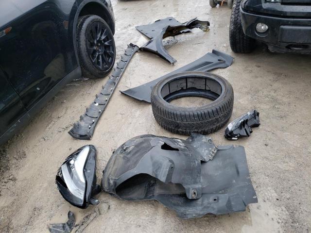 Photo 13 from auction – 2021 TESLA MODEL Y with VIN 5YJYGDEE5MF265434