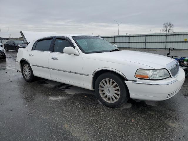 Photo 4 from auction – 2003 LINCOLN TOWN CAR E with VIN 1LNHM81W23Y629768