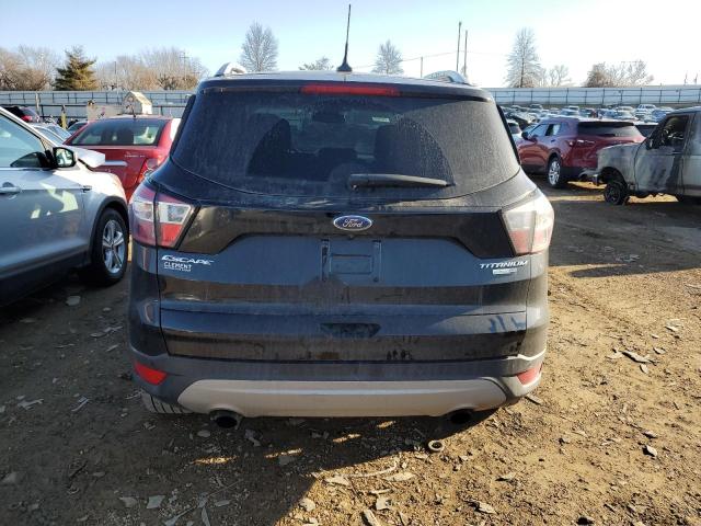 Photo 6 from auction – 2018 FORD ESCAPE TIT with VIN 1FMCU9J94JUC34683