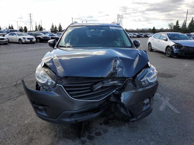 Photo 5 from auction – 2016 MAZDA CX-5 GT with VIN JM3KE2DY8G0883899