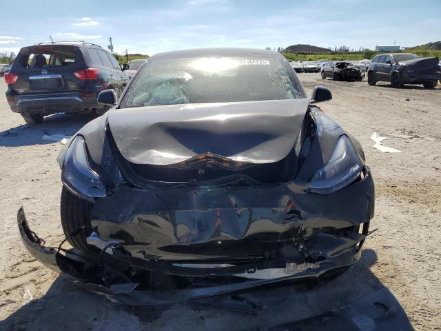 Photo 5 from auction – 2021 TESLA MODEL 3 with VIN 5YJ3E1EAXMF981029