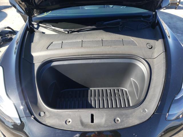 Photo 11 from auction – 2022 TESLA MODEL Y with VIN 7SAYGDEF7NF486899