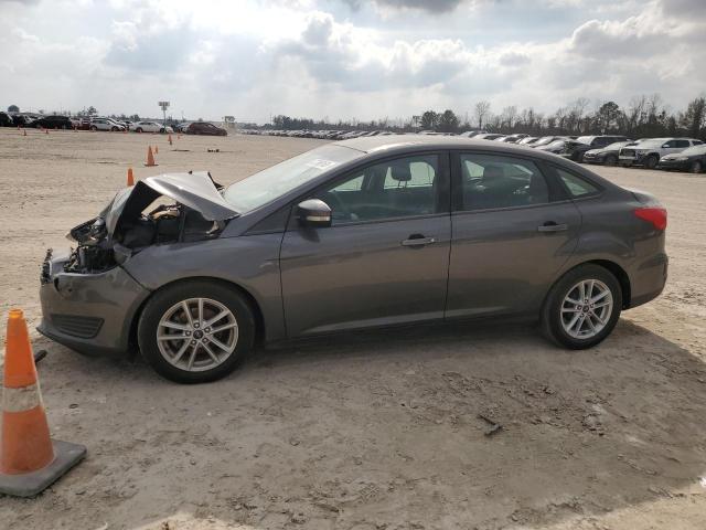 FORD FOCUS SE 2017 with VIN 1FADP3F21HL208377 - Photo from auction
