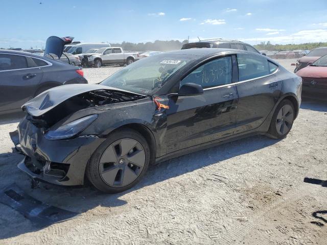 TESLA MODEL 3 2021 with VIN 5YJ3E1EAXMF981029 - Photo from auction