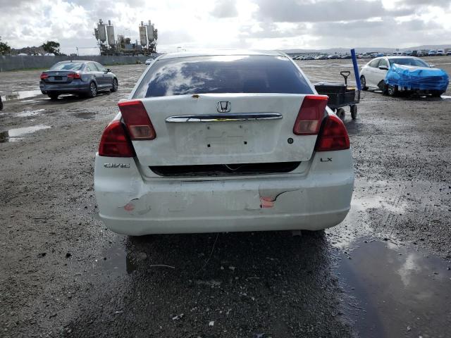 Photo 6 from auction – 2002 HONDA CIVIC LX with VIN 1HGES16562L041440