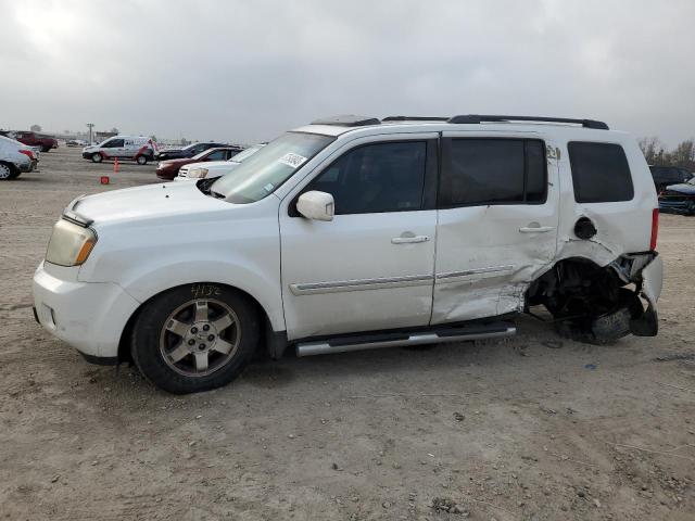 HONDA PILOT TOUR 2011 with VIN 5FNYF3H91BB048262 - Photo from auction