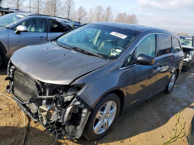 HONDA ODYSSEY TO 2012 with VIN 5FNRL5H94CB071657 - Photo from auction