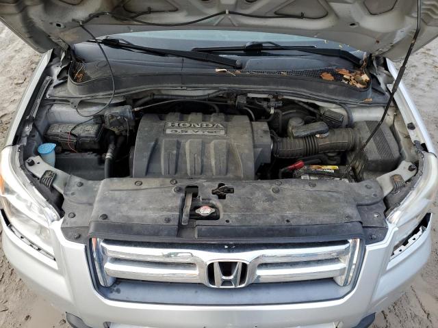 Photo 12 from auction – 2006 HONDA PILOT EX with VIN 2HKYF18506H514630