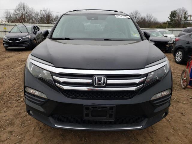 Photo 5 from auction – 2016 HONDA PILOT TOUR with VIN 5FNYF6H96GB012897