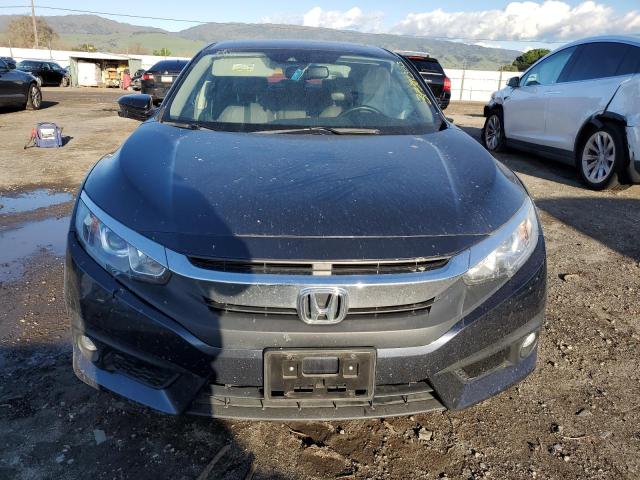 Photo 5 from auction – 2018 HONDA CIVIC EX with VIN JHMFC1F82JX043864