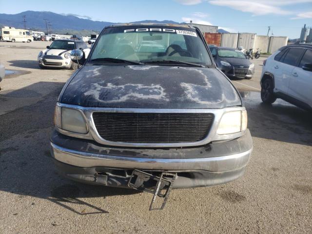 Photo 5 from auction – 2000 FORD F150 with VIN 1FTZF1724YKA79983