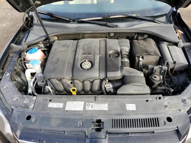 Photo 11 from auction – 2014 VOLKSWAGEN 2 DR with VIN 1VWAP7A38EC011851