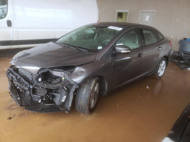 FORD FOCUS SE 2014 with VIN 1FADP3F21EL425410 - Photo from auction