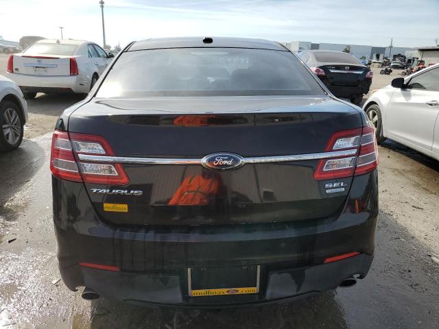 Photo 6 from auction – 2014 FORD TAURUS SEL with VIN 1FAHP2E94EG102200