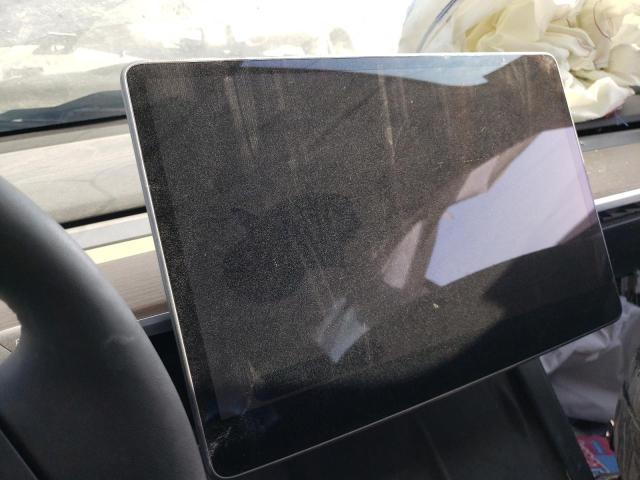 Photo 9 from auction – 2022 TESLA MODEL 3 with VIN 5YJ3E1EC7NF163356