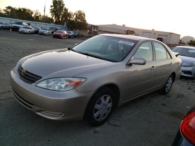 TOYOTA CAMRY LE 2002 with VIN JTDBE32KX20030197 - Photo from auction