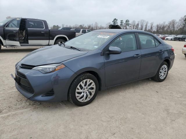 TOYOTA COROLLA L 2017 with VIN 5YFBURHE1HP716649 - Photo from auction