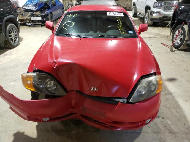 Photo 11 from auction – 2003 HYUNDAI TIBERON with VIN KMHHN65F23U037824