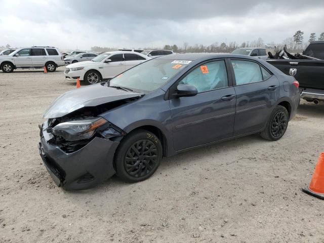TOYOTA COROLLA L 2019 with VIN 5YFBURHE0KP869885 - Photo from auction