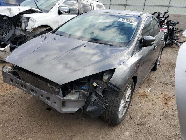FORD FOCUS SE 2015 with VIN 1FADP3F26FL342220 - Photo from auction