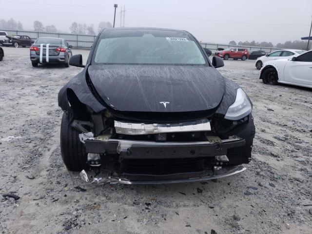 Photo 5 from auction – 2021 TESLA MODEL Y with VIN 5YJYGAEE6MF131191