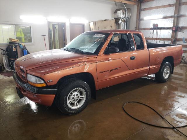 DODGE DAKOTA 2000 with VIN 1B7GL22N5YS617873 - Photo from auction