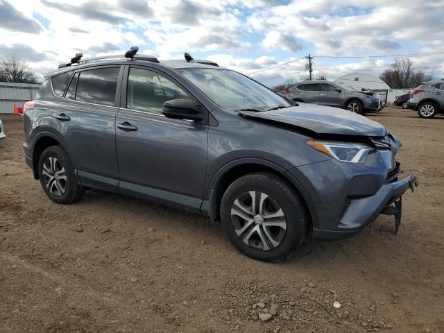 Photo 4 from auction – 2017 TOYOTA RAV4 LE with VIN JTMBFREV7HD204864