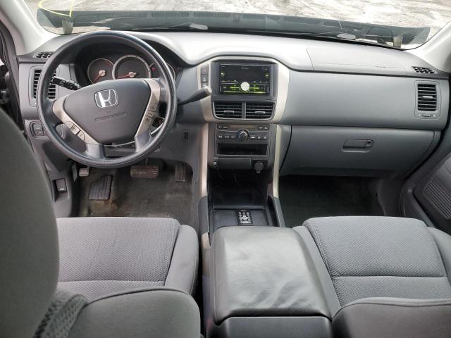 Photo 8 from auction – 2006 HONDA PILOT EX with VIN 2HKYF18436H558094