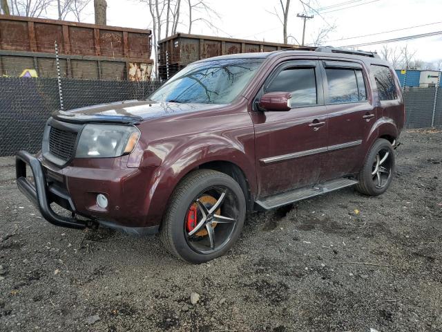 HONDA PILOT TOUR 2010 with VIN 5FNYF4H85AB001523 - Photo from auction