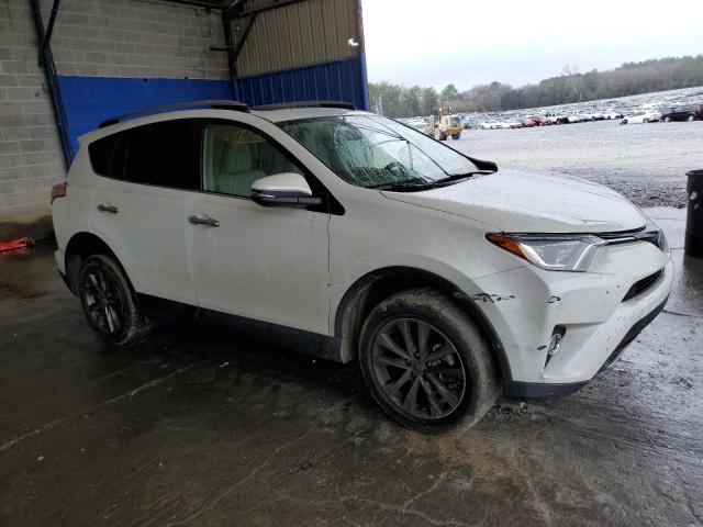 Photo 4 from auction – 2018 TOYOTA RAV4 LIMIT with VIN JTMDFREV3JJ235562