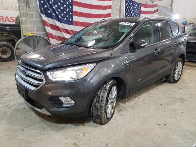 FORD ESCAPE TIT 2017 with VIN 1FMCU0J99HUB46122 - Photo from auction