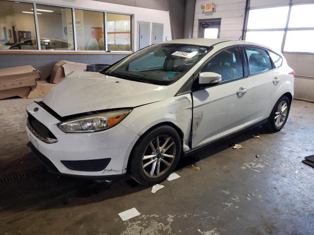 FORD FOCUS SE 2015 with VIN 1FADP3K29FL238990 - Photo from auction