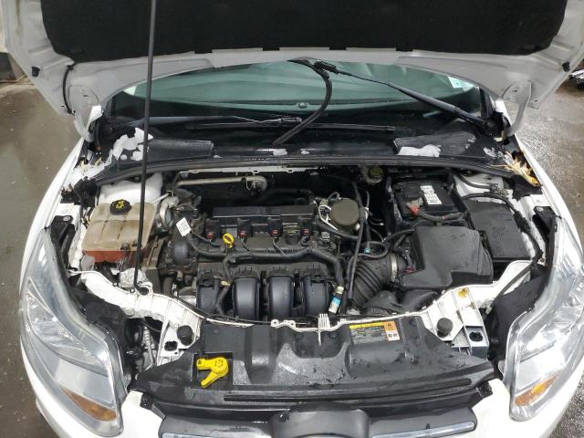 Photo 11 from auction – 2014 FORD FOCUS SE with VIN 1FADP3K29EL197890