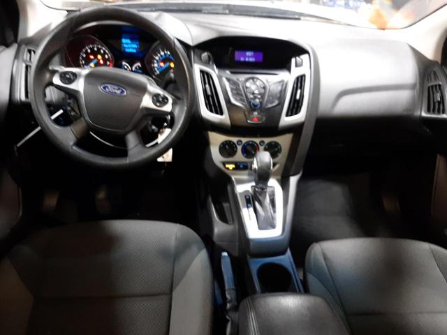 Photo 8 from auction – 2012 FORD FOCUS SE with VIN 1FAHP3F22CL323564