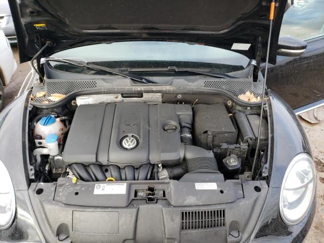 Photo 11 from auction – 2014 VOLKSWAGEN BEETLE with VIN 3VWJP7AT3EM625026
