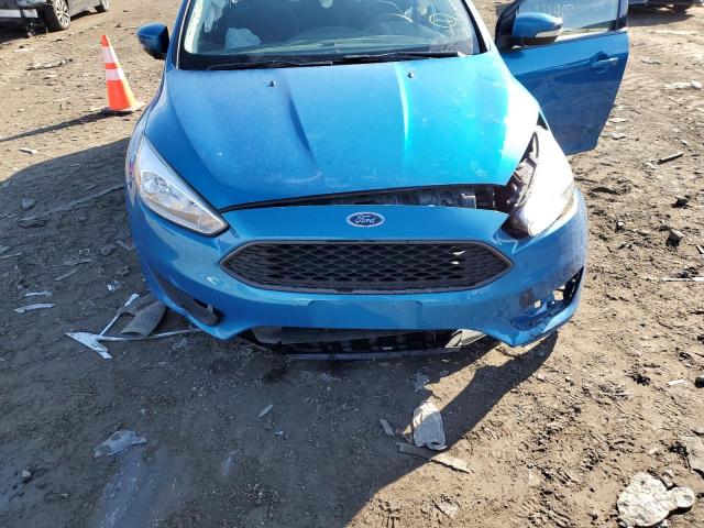 Photo 11 from auction – 2016 FORD FOCUS SE with VIN 1FADP3F27GL393825