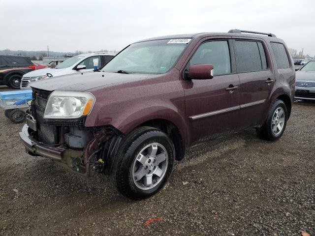 HONDA PILOT TOUR 2011 with VIN 5FNYF4H92BB082474 - Photo from auction