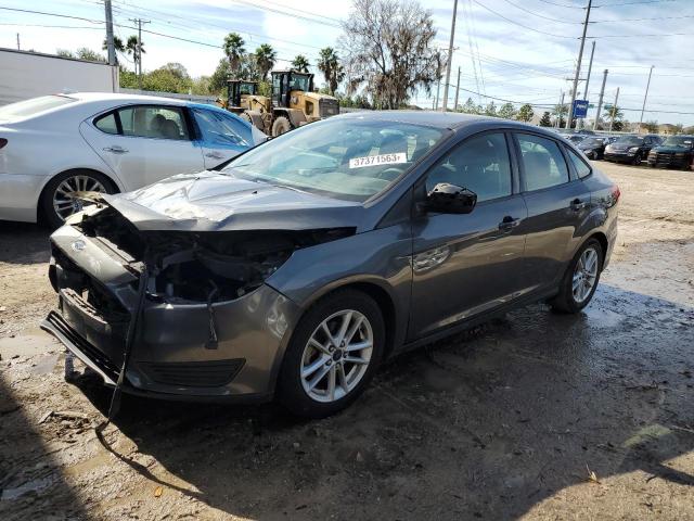 FORD FOCUS SE 2015 with VIN 1FADP3F23FL205476 - Photo from auction